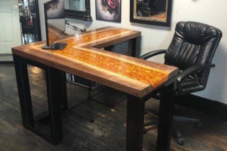 L shaped dark walnut and epoxy desk